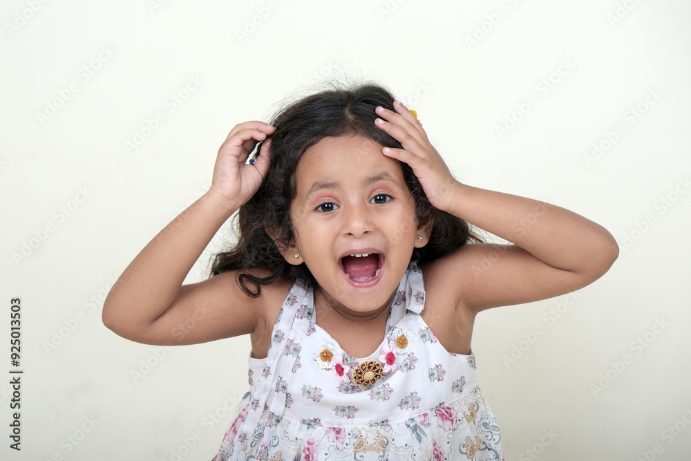 A delightful little girl with sparkling eyes, breaking into a wide, infectious smile. Her expression radiates pure happiness and innocence. A delightful little girl with sparkling eyes, breaking into a wide, infectious smile. Her expression radiates pure happiness and innocence.