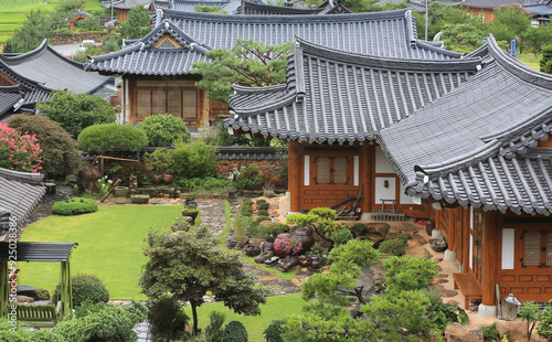 Wollam-ri, Gangjin-gun, Jeollanam-do, South Korea - August A, 2022: High angle and summer view of tiled house and yard at Gangjin Dalbit Hanok Village