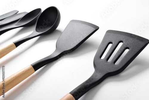 Silicone cooking utensils set with wooden handle isolated on white background. Kitchen tool sets