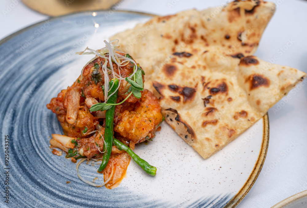 Prawn curry with naan bread Prawn curry with naan bread