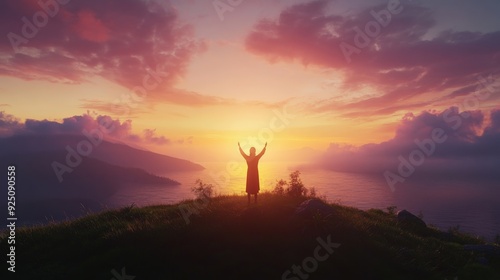 A person stands on a hilltop with arms raised, embracing the breathtaking sunset over the ocean and hills