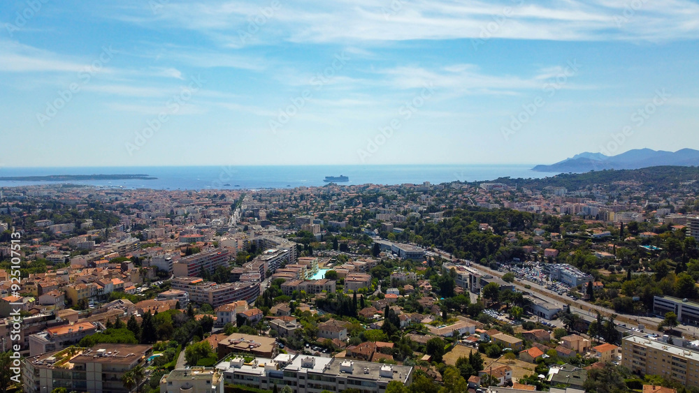 Fototapeta premium View of the coastal city of Cannes on the French Riviera in France. City famous for the film festival. Wonderful coastal city, tourist destination for travel and cruises. Wonders of the Mediterranean