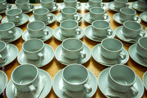 Ceramic cups, arranged neatly, break food