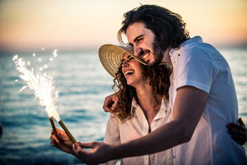 Young couple sharing happy  and love mood on the beach