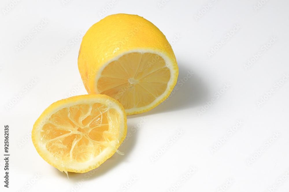 fresh with cut half and squeezed lemon fruit isolated on white background. fresh with cut half and squeezed lemon fruit isolated on white background.