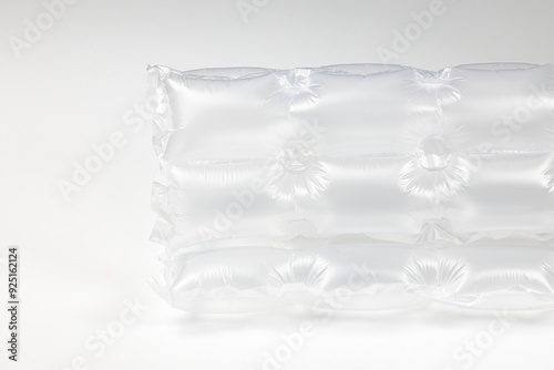 Close up plastic translucent air packaging, Plastic translucent packaging with air cushion. Inflatable air bag isolated on white background.