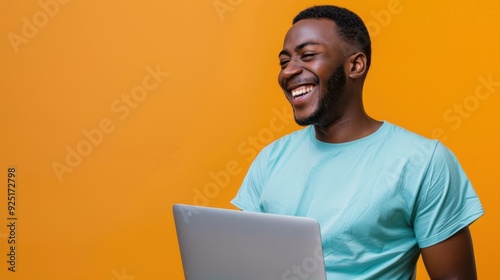 The smiling man with laptop