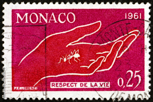 Obraz na płótnie Postage stamp Monaco 1961 hand and ant, respect for life w salonie