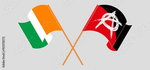 Crossed and waving flags of Ivory Coast and Anarchy