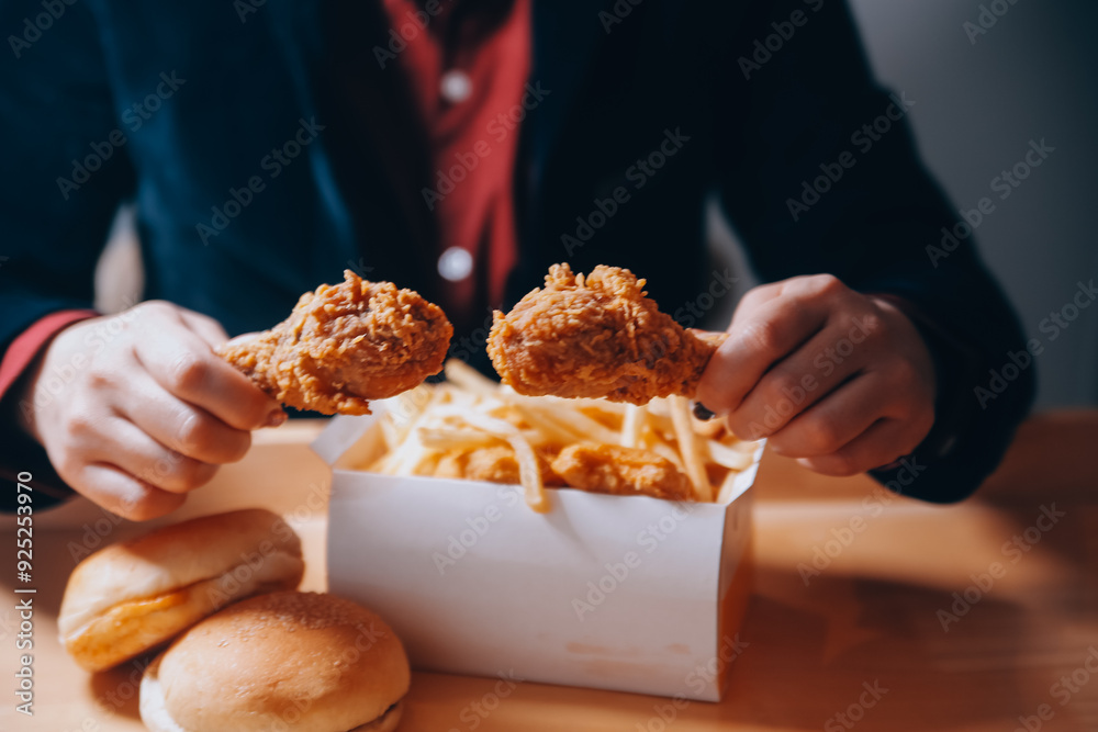 close up focus woman hand hold fried chicken for eat,girl with fast food concept close up focus woman hand hold fried chicken for eat,girl with fast food concept