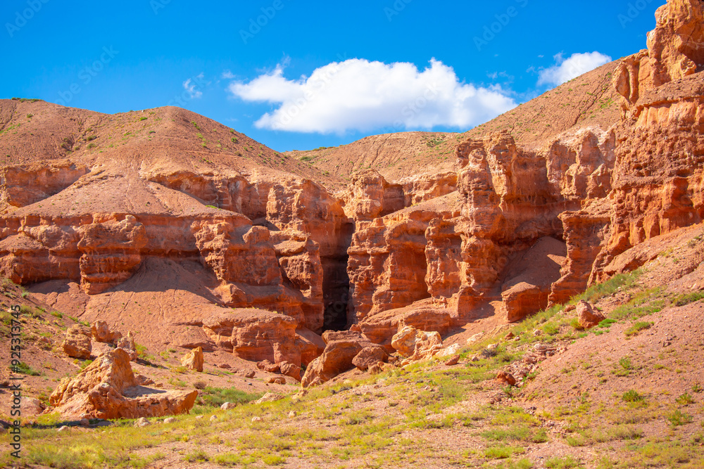 Charyn Canyon, Valley of Castles. The excellence of Kazakhstan. Panorama of natural unusual landscape. The red canyon of extraordinary beauty looks like a Martian landscape. Charyn Canyon, Valley of Castles. The excellence of Kazakhstan. Panorama of natural unusual landscape. The red canyon of extraordinary beauty looks like a Martian landscape.