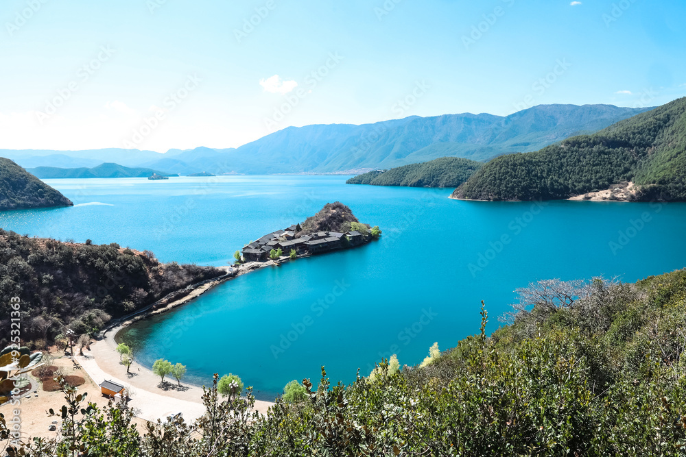 Lugu Lake, China - March 30th, 2024:
Lugu lake in the mountains. Lugu Lake, China - March 30th, 2024:
Lugu lake in the mountains.