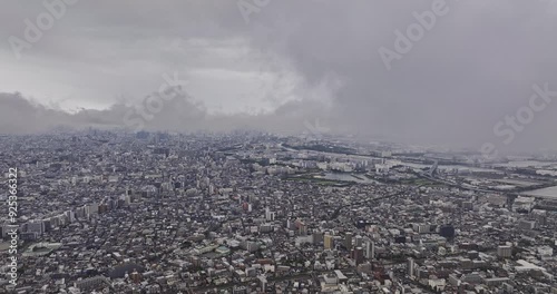 Tokyo Japan Aerial v220 high altitude flyover Nishikojiya capturing densely populated cityscape of Ota city on an overcast day - Shot with Mavic 3 Pro Cine - October 2023 photo