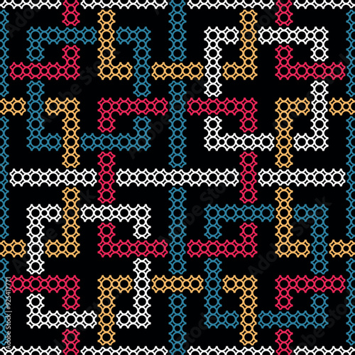 Seamless abstract geometric pattern with intersecting squares decorated with small blue, red, yellow, and white circles and dots on a black background. Traditional ethnic design in modern style.