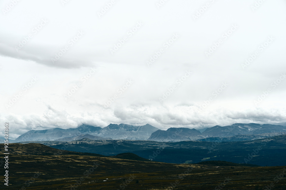 View towards the Rondane Mountains from Einunndalen Valley, Norway's longest summer farm valley or View towards the Rondane Mountains from Einunndalen Valley, Norway's longest summer farm valley or