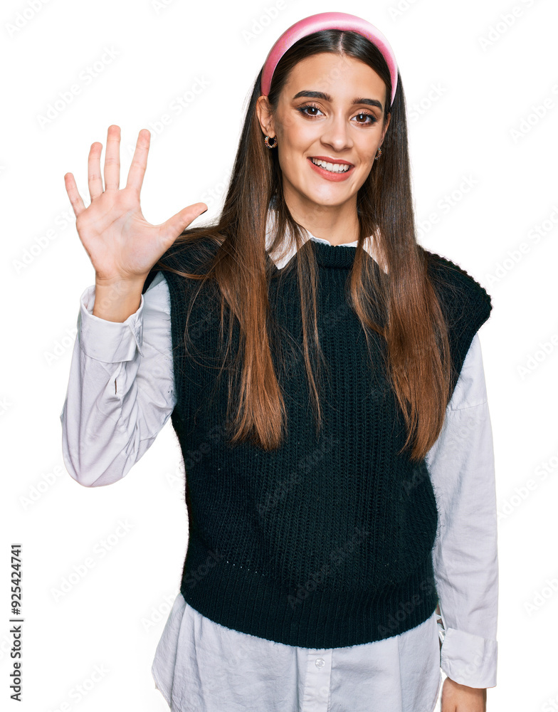 Young beautiful woman wearing casual white shirt showing and pointing up with fingers number five while smiling confident and happy. Young beautiful woman wearing casual white shirt showing and pointing up with fingers number five while smiling confident and happy.