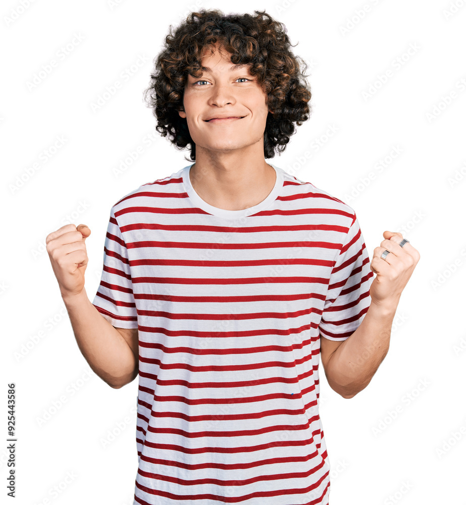 Caucasian teenager wearing casual clothes celebrating surprised and amazed for success with arms raised and open eyes. winner concept.