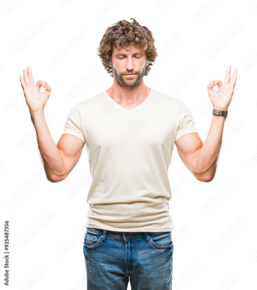 Handsome hispanic model man over isolated background relax and smiling with eyes closed doing meditation gesture with fingers. Yoga concept. Handsome hispanic model man over isolated background relax and smiling with eyes closed doing meditation gesture with fingers. Yoga concept.