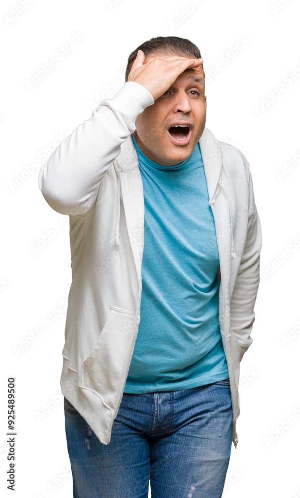 Fototapeta premium Middle age arab man wearing sweatshirt over isolated background very happy and smiling looking far away with hand over head. Searching concept.