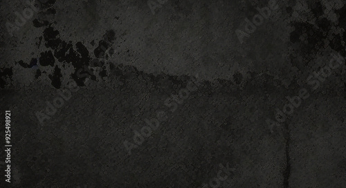 Versatile dark gray textured background with ample space for a variety of design projects 