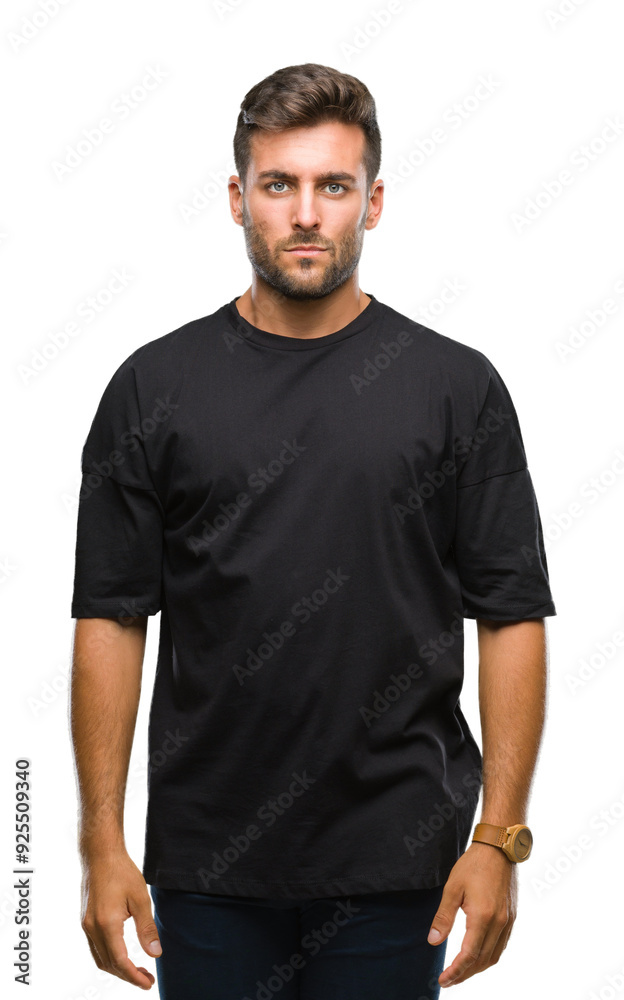 Young handsome man over isolated background with serious expression on face. Simple and natural looking at the camera. Young handsome man over isolated background with serious expression on face. Simple and natural looking at the camera.