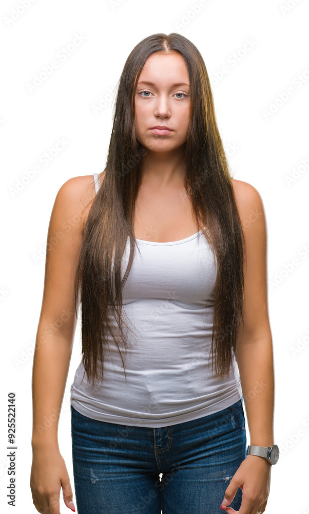 Young caucasian beautiful woman over isolated background with serious expression on face. Simple and natural looking at the camera. Young caucasian beautiful woman over isolated background with serious expression on face. Simple and natural looking at the camera.