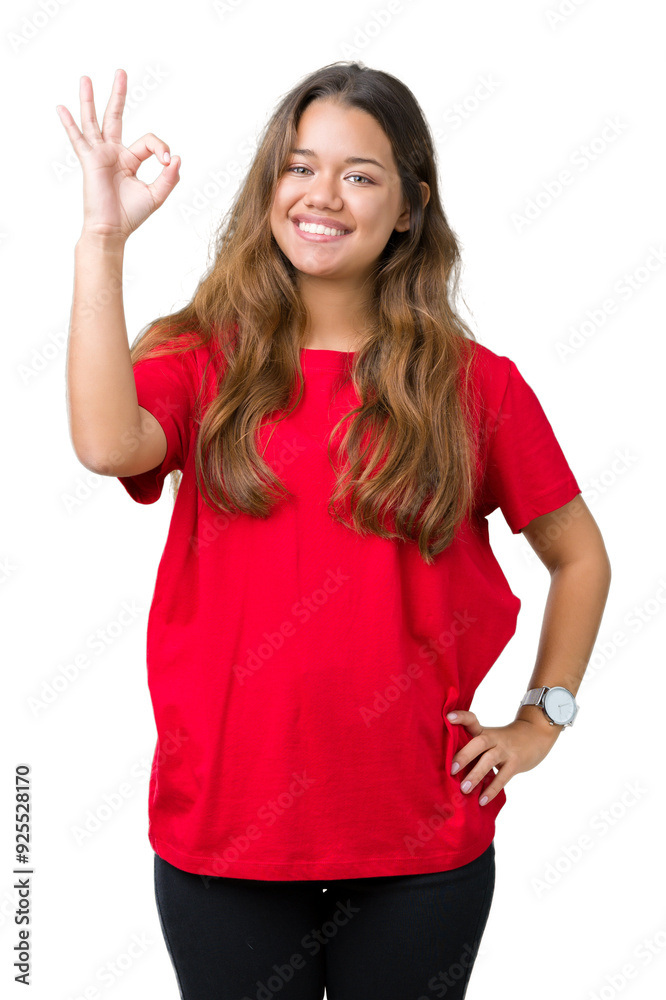 Young beautiful brunette woman wearing red t-shirt over isolated background smiling positive doing ok sign with hand and fingers. Successful expression. Young beautiful brunette woman wearing red t-shirt over isolated background smiling positive doing ok sign with hand and fingers. Successful expression.