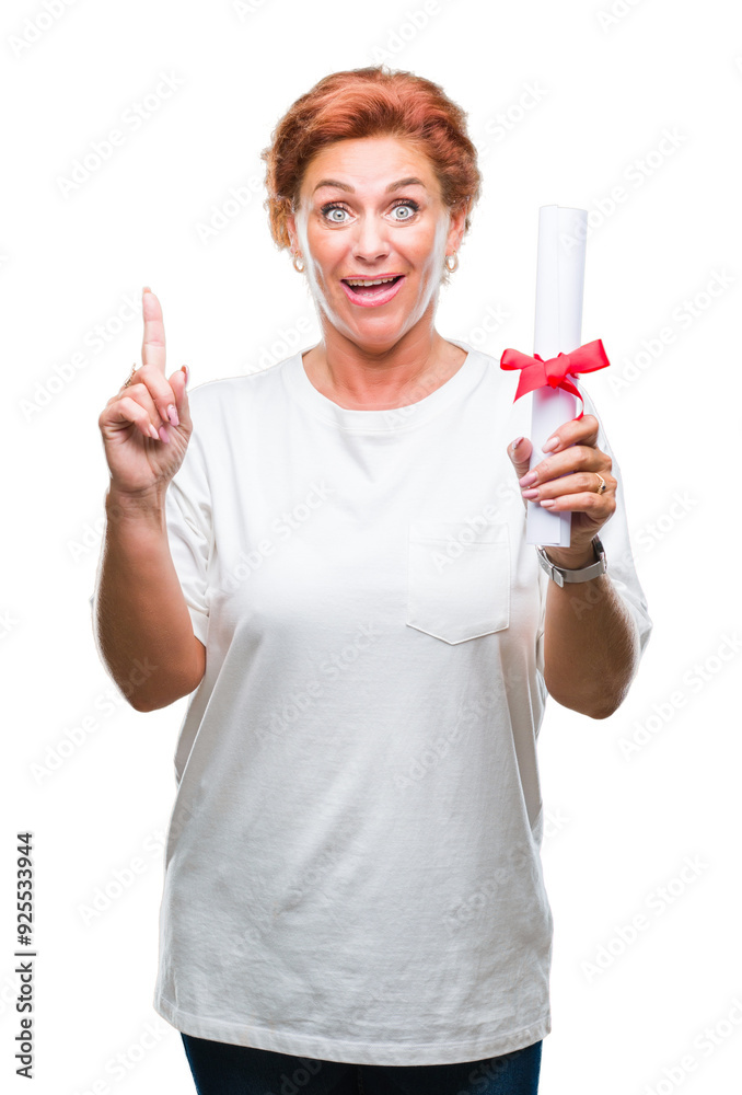 Senior caucasian woman holding degree certificate over isolated background surprised with an idea or question pointing finger with happy face, number one Senior caucasian woman holding degree certificate over isolated background surprised with an idea or question pointing finger with happy face, number one