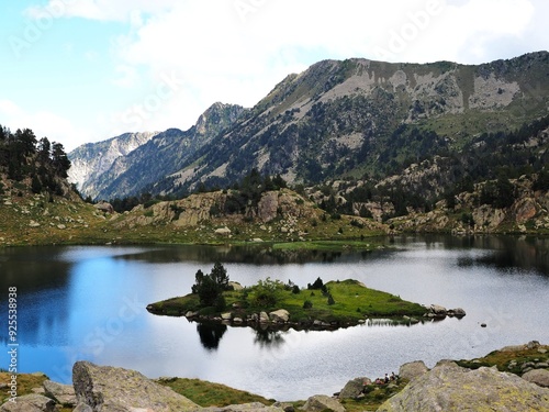 Stunning alpine lake nestled in the mountains: Llac del Circ de Colomers, also known as Lake of the Colomers Cirque, located in the Pyrenees near Salardú, Val d'Aran, Lleida, Catalonia photo