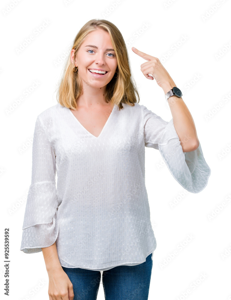 Beautiful young elegant woman over isolated background Smiling pointing to head with one finger, great idea or thought, good memory Beautiful young elegant woman over isolated background Smiling pointing to head with one finger, great idea or thought, good memory