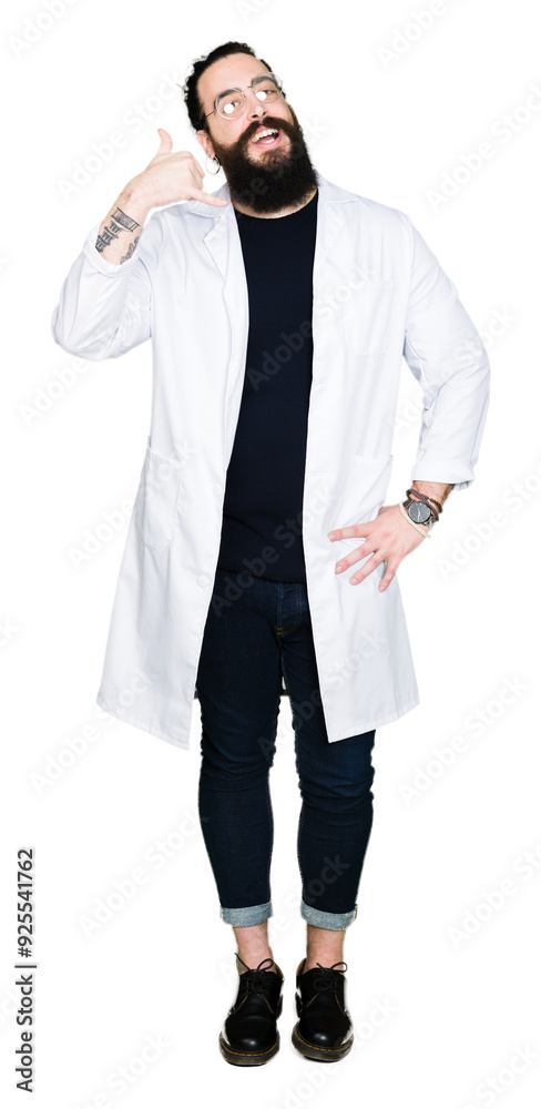 Doctor therapist man with long hair and bear wearing white coat smiling doing phone gesture with hand and fingers like talking on the telephone. Communicating concepts. Doctor therapist man with long hair and bear wearing white coat smiling doing phone gesture with hand and fingers like talking on the telephone. Communicating concepts.