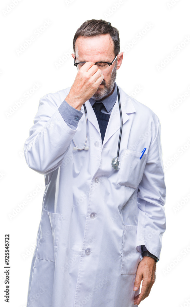 Middle age senior hoary doctor man wearing medical uniform isolated background tired rubbing nose and eyes feeling fatigue and headache. Stress and frustration concept. Middle age senior hoary doctor man wearing medical uniform isolated background tired rubbing nose and eyes feeling fatigue and headache. Stress and frustration concept.