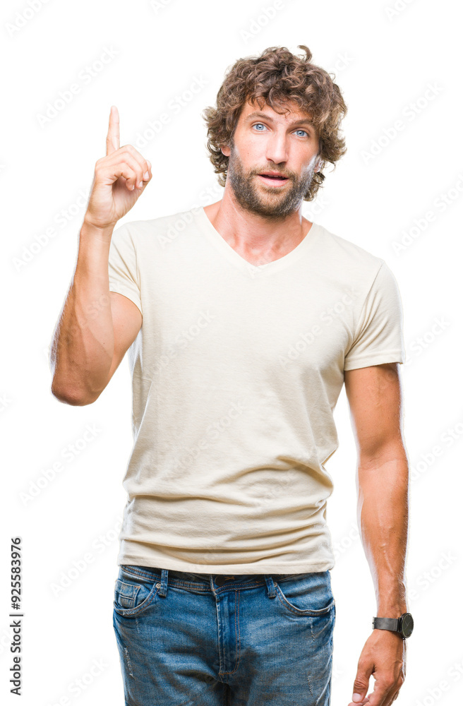 Handsome hispanic model man over isolated background pointing finger up with successful idea. Exited and happy. Number one. Handsome hispanic model man over isolated background pointing finger up with successful idea. Exited and happy. Number one.