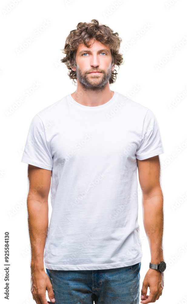 Handsome hispanic model man over isolated background with serious expression on face. Simple and natural looking at the camera. Handsome hispanic model man over isolated background with serious expression on face. Simple and natural looking at the camera.