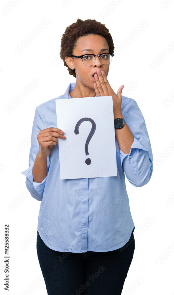 Young african american woman holding paper with question mark over isolated background cover mouth with hand shocked with shame for mistake, expression of fear, scared in silence, secret concept Young african american woman holding paper with question mark over isolated background cover mouth with hand shocked with shame for mistake, expression of fear, scared in silence, secret concept