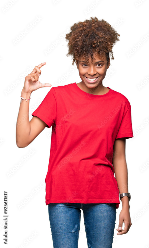 Beautiful young african american woman over isolated background smiling and confident gesturing with hand doing size sign with fingers while looking and the camera. Measure concept. Beautiful young african american woman over isolated background smiling and confident gesturing with hand doing size sign with fingers while looking and the camera. Measure concept.