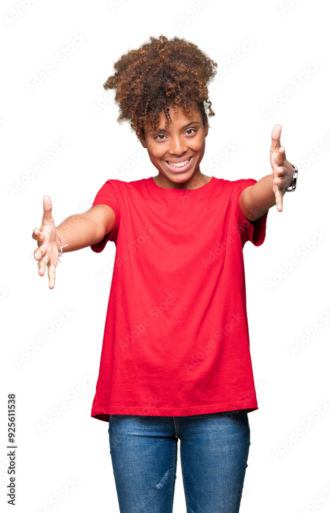 Beautiful young african american woman over isolated background looking at the camera smiling with open arms for hug. Cheerful expression embracing happiness. Beautiful young african american woman over isolated background looking at the camera smiling with open arms for hug. Cheerful expression embracing happiness.