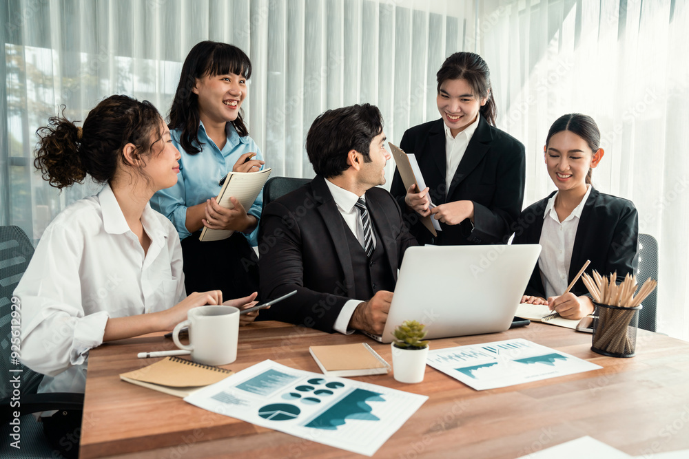 Diverse group of business analyst team analyzing financial data report paper on office table. Chart and graph dashboard by business intelligence analysis for strategic marketing planning Habiliment Diverse group of business analyst team analyzing financial data report paper on office table. Chart and graph dashboard by business intelligence analysis for strategic marketing planning Habiliment