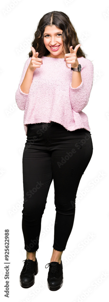 Fototapeta premium Young beautiful woman wearing pink sweater pointing fingers to camera with happy and funny face. Good energy and vibes.