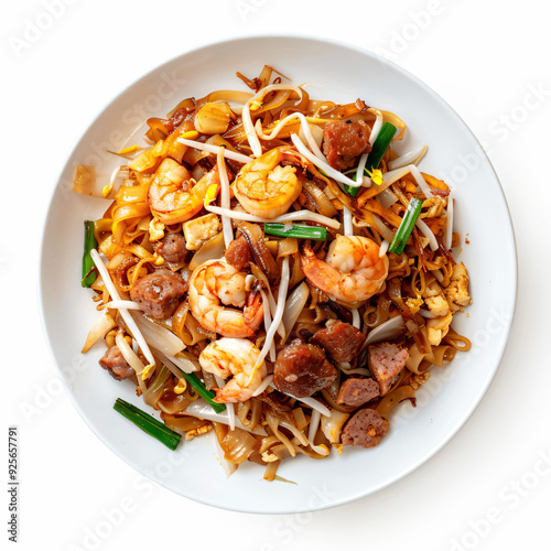 a plate of food with shrimp meat and noodles