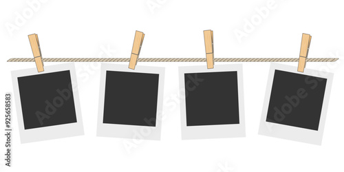 blank photo frames hanging on rope with wooden clips