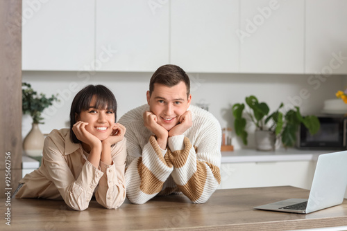 Young loving couple at tabl...