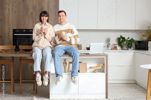 Young loving couple with cu...