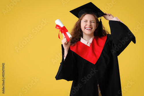 Happy female graduating stu...