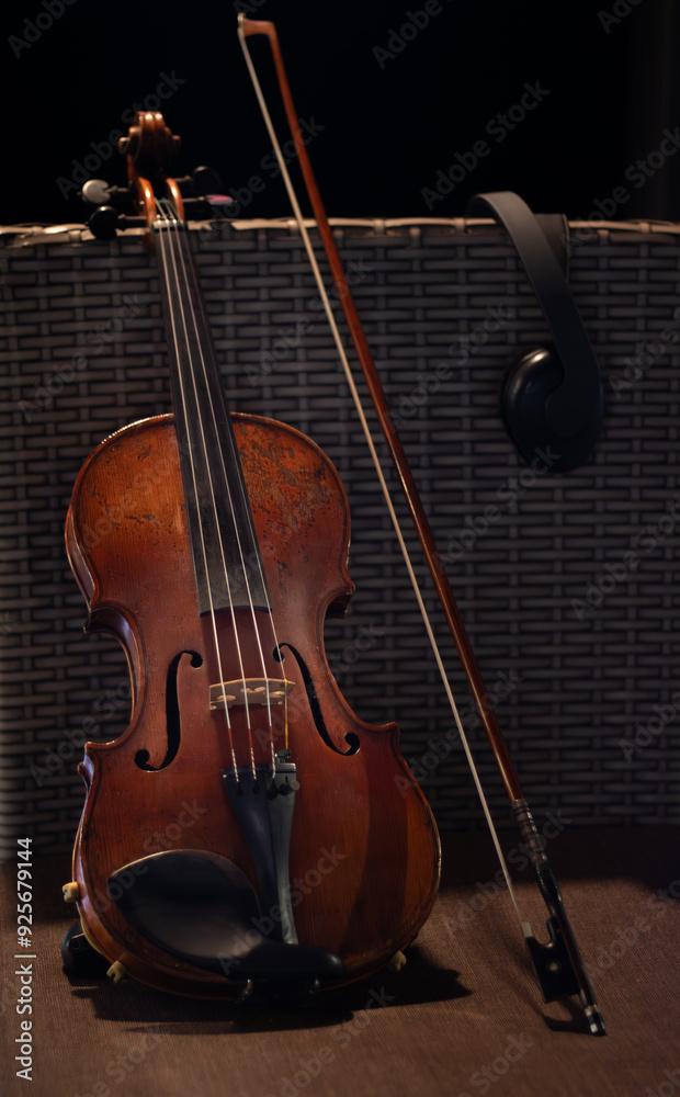 Fototapeta premium violin is recording studio on a chair - close up