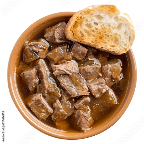 a bowl of stew with a piece of bread photo