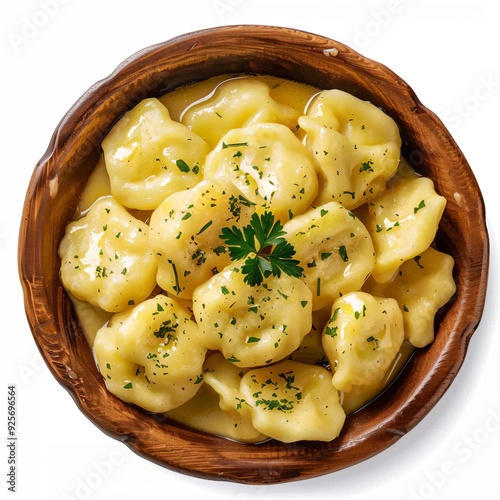 a bowl of pasta with parsley on top