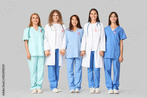 Female doctors with pink ri...