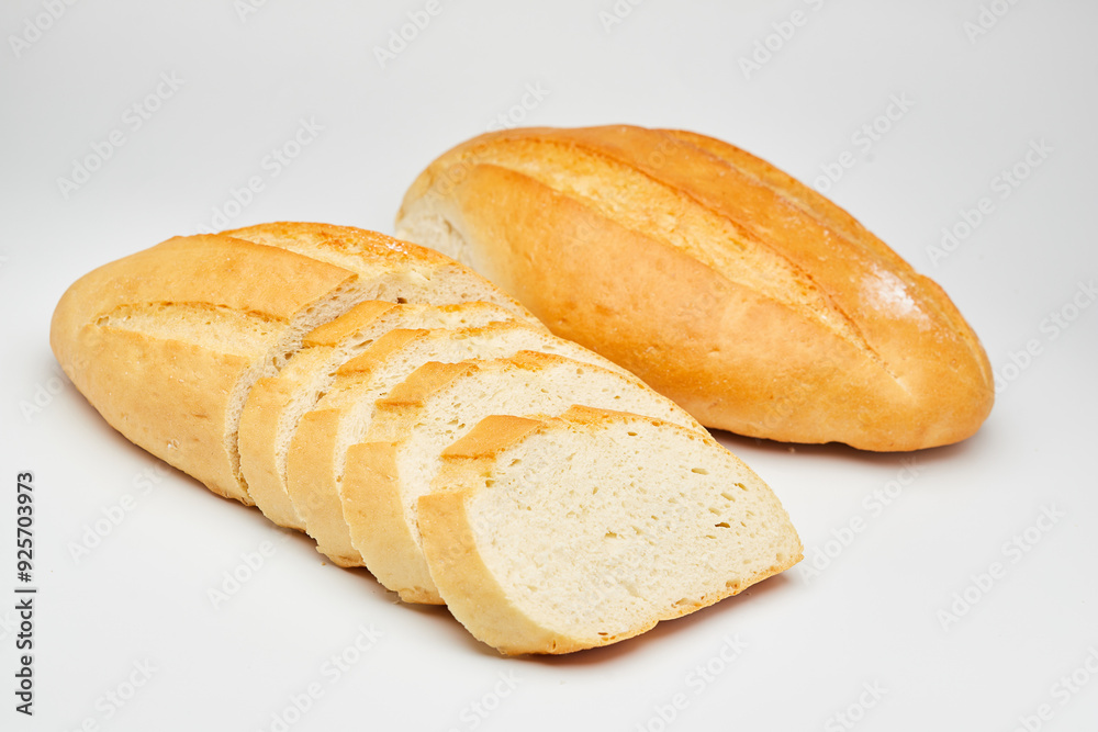 Freshly baked white bread loaf, sliced and ready to serve, perfect for sandwiches and breakfast Freshly baked white bread loaf, sliced and ready to serve, perfect for sandwiches and breakfast