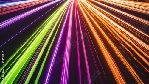 Dynamic light trails create a vibrant, abstract night scene showcasing energy and speed, perfect for artistic and technological themes